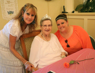Image: Mother and grandmother Grace McCull receives the royal treatment from daughter Verna Killebrew (Left) and granddaughter Wendy Gaines (Right) on Mother’s Day!