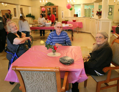 Image: Jan Wolaver (Italy), Wendell Anthony (Avalon) and Angela Welch (Desoto) share a table during the Mother’s Day celebration at Trinity Nursing and Rehab in Italy.