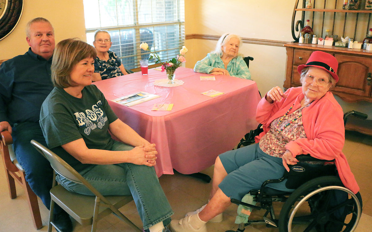 Image: Taking a moment form the Mother’s Day celebration to have a photo taken.