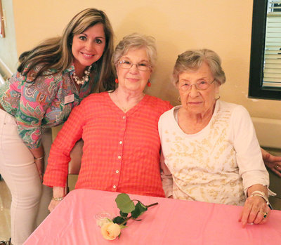 Image: Laura Tesmer (Left) with Kindred at Home Hospice, who sponsored the event, poses with Marylin Crowell who was enjoying Trinity’s Mother’s Day celebration with her mother and resident, Charlene Brown (Right). Laura also volunteers at Trinity on a regular basis by doing nails for the residents.