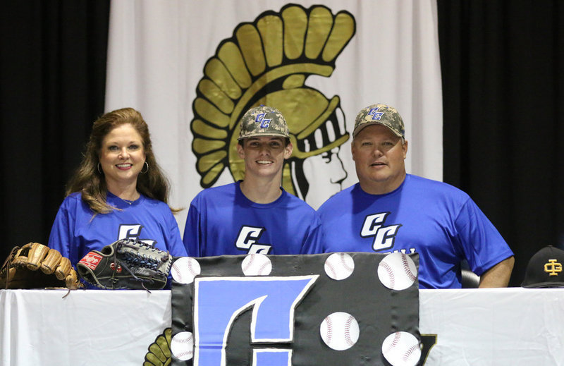 Image: Zooming in to capture the pride and joy on Ty Windham and his parents Andi and Joe Windham’s faces after Ty committed to play baseball for Cisco College after graduation Italy HS.