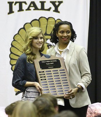 Image: Lady Gladiator head volleyball Coach Laquita Walker presented senior Halee Turner with the Team MVP Award back during the Italy High School Fall Athletic Banquet.