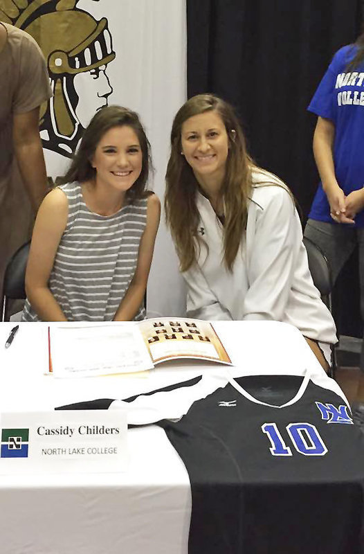 Image: Italy senior Lady Gladiator Cassidy Childers is pictured with North Lake College head volleyball coach Cathy Carter as Childers commits to play volleyball for the Lady Blazers.