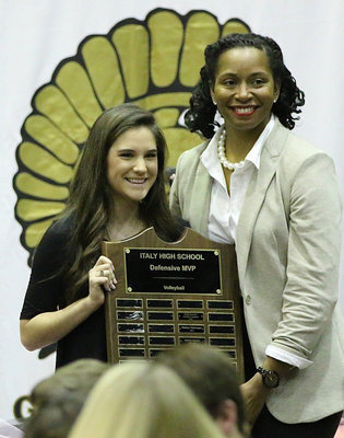 Image: Lady Gladiator head volleyball Coach Laquita Walker presented senior Cassidy Childers with the Volleyball Defensive MVP Award back during the Italy Athletic Fall Banquet.