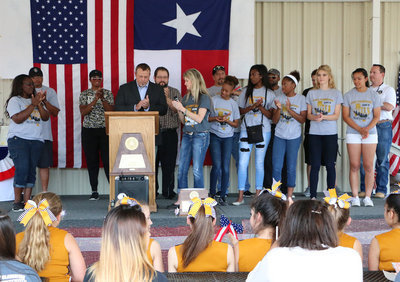 Image: Italy Mayor Steven Farmer concludes the reading of the proclamation as a congratulatory applause from fans celebrates their state champion ladies and coaches accomplishments.