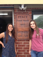 Image: Ashlyn Jacinto and Amber Hooker delivers much needed can goods to the Italy Food Pantry on behalf of the Italy High School National Honor Society.