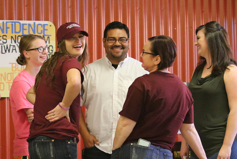 Image: The Hooker Family recalls fun times while wishing now former Italy High school band director, Jesus Perez, good luck at his new job at Midlothian Heritage High School.