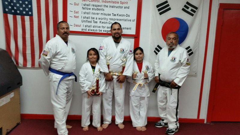 Image: Pictured are Roger Sam, Turtle Cadet Instructor,  a program for 3, 4 and 5 year old children, Analy Salas, Juan Salas, Joana Salas, and Master Charles Kight-Chief Instructor of the Hillsboro Unified Tae Kwon Do School.