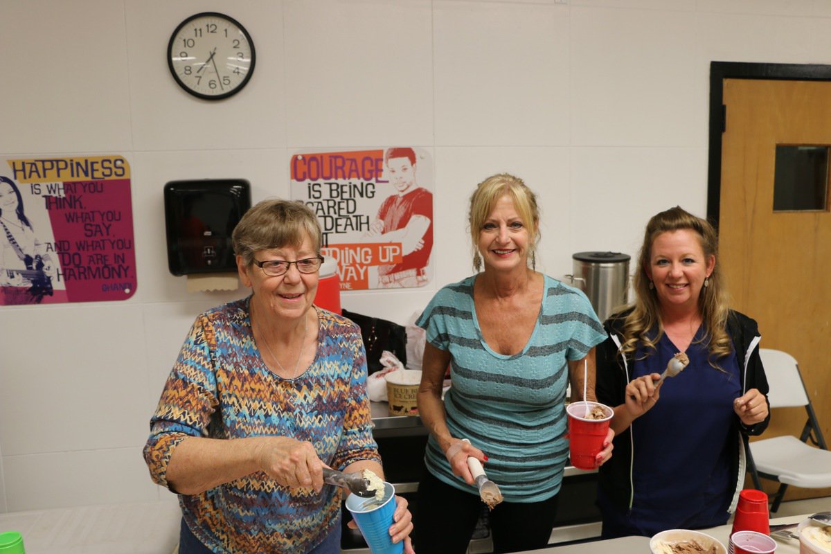 Image: Band Boosters served ice cream for all of the students and parents.  From left to right, Linda Goodman, Sandy Stiles-Smith, President, and Shelly Huskins, Vice President.