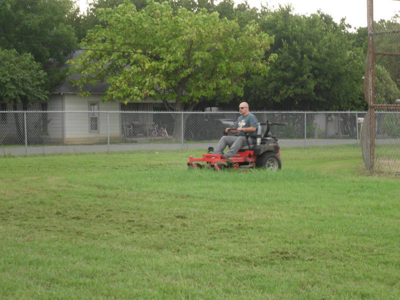 Image: Superintendent Lee Joffre pitched in on Saturday to get the campus ready for students.