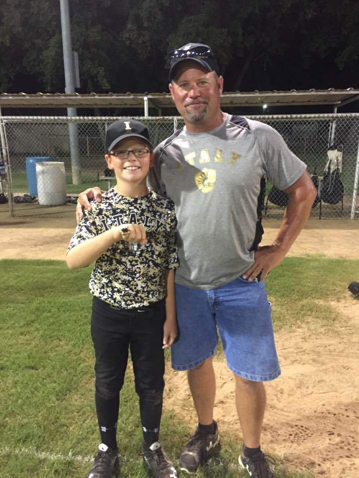 Image: Clayton Hellner shows off his tournament ring along with father/coach Jay Hellner.