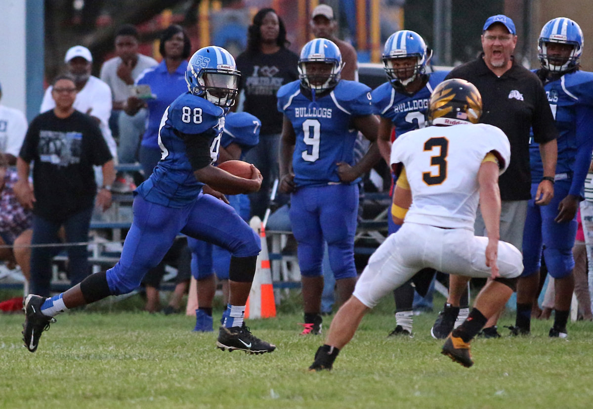 Image: Milford’s #88 Markavion Thompson picks up valuable yardage after making a catch.