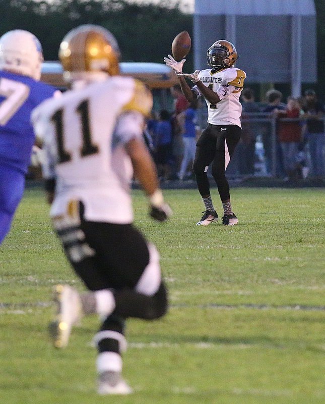 Image: Fielding a Blooming Grove punt is Italys’ #1 Kevin Johnson.