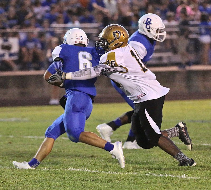 Image: Italy defensive tackle #16 Kenneth Norwood, Jr. breaks into the Blooming Grove backfield.
