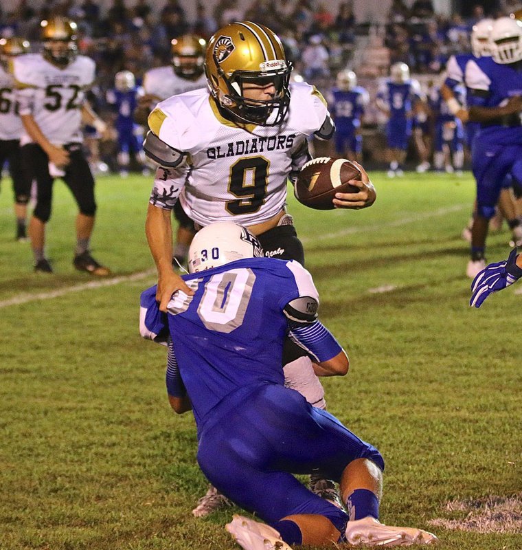 Image: Junior receiver #9 Gary Escamilla gets all he can out of a short pass for Italy, turning it into a 7 yard gain.