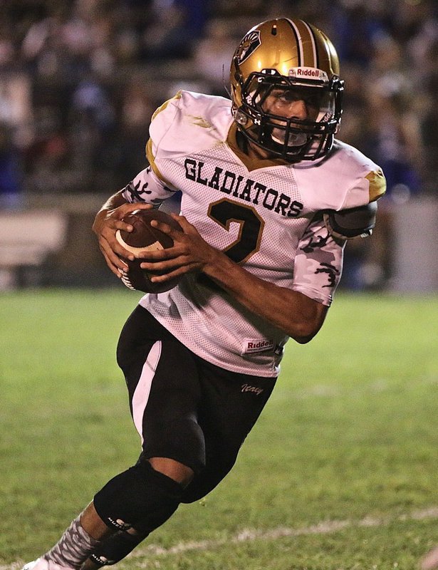 Image: Italy Gladiator junior quarterback #2 Tylan Wallace helped lead Italy to a 42-0 shutout win over Blooming Grove. Wallace went 6-of-11 for 138 passing yards and rushed for 36 yards against the Lions.