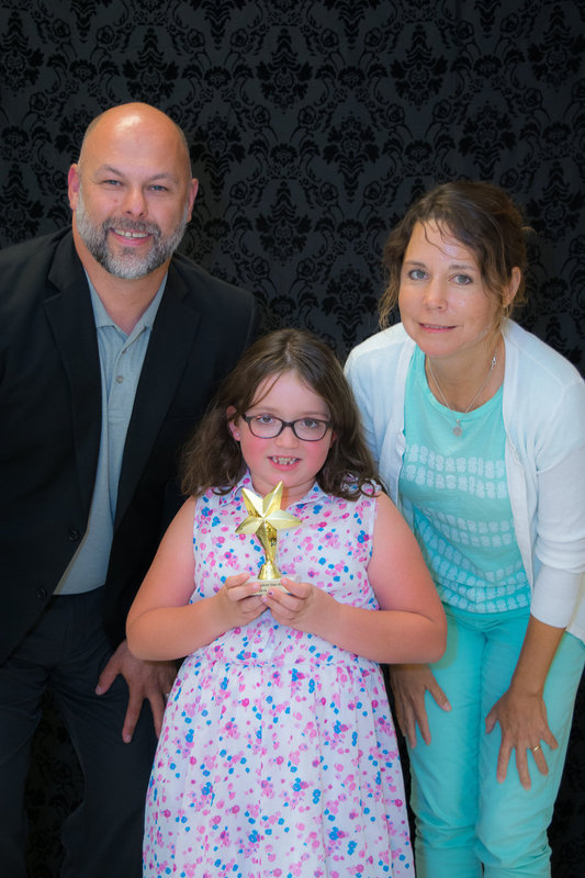 Image: Hailey Glover received the Star Award for 2nd Grade from Mr. Joffre and her teacher, Mrs. Hyles.