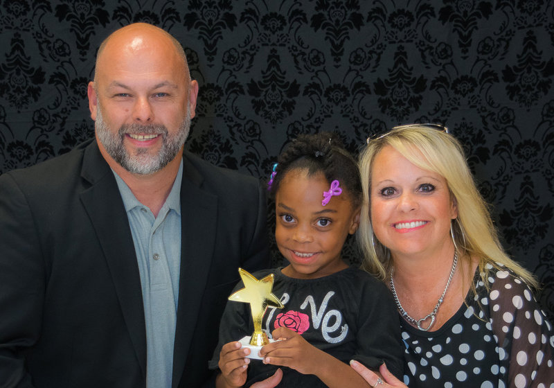 Image: Kaliyah Jenkins received the Kindergarten Star Award from Mr. Joffre and her teacher Mrs. Nelson.
