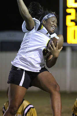 Image: Senior receiver Aarion Copeland leaps for joy after coming up with a difficult catch.