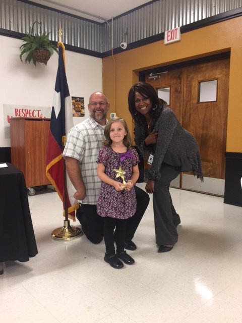 Image: PreK Superintendent Star Student, Noelle VanOmmeren with Mr. Joffre, Superintendent and Ms. Thomas, Principal of Stafford Elementary