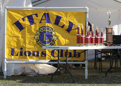 Image: The Italy Lions Club banner backdrops the trophies about to be presented.