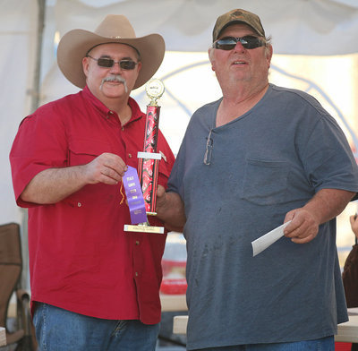 Image: Italy Lions Club member Donald Brummett presents Robt Erlansor with a ribbon and a trophy!