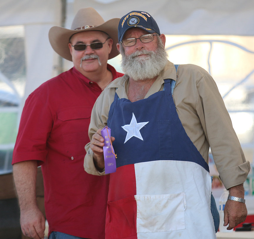 Image: Italy Lions Club member Donald Brummett presents Terry Bowling, of Blooming Grove, with a ribbon.