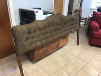 Image: Antique headboard recently reupholstered by Clarence Snell in a suede fabric. 
This headboard originally had zero pleats and tufting. Besides looking awesome, it is like a brand new piece!