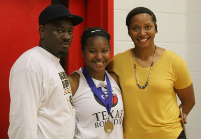 Image: Proud father, Aaron Copeland, poses with his All-Star daughter, Aarion Copeland, and her Italy Lady Gladiator Basketball head coach LaQuita Parker.