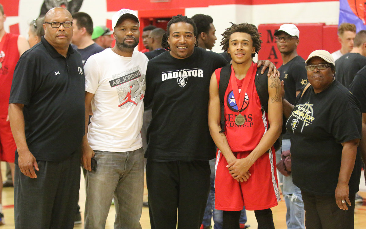 Image: Posing with an All-Star are (L-R): Assistant Italy boys basketball coach Larry Mayberry, Italy boys head basketball coach David Ervin, proud “Dadiator” Keith Davis, All-Star Keith Davis II, and proud grandma Brenda Davis.