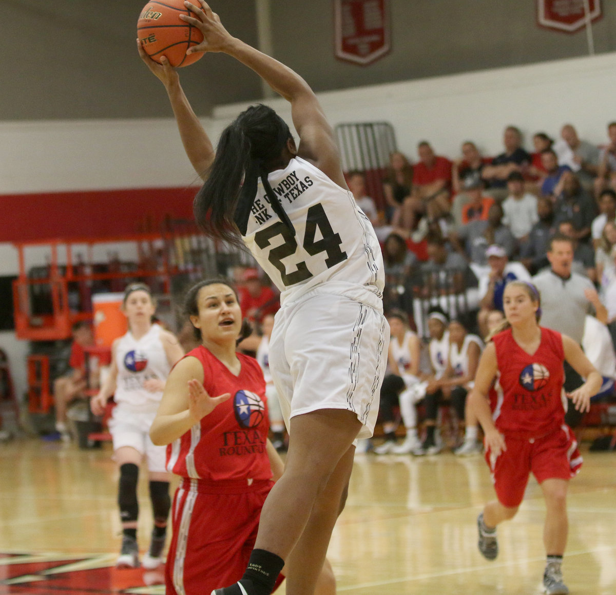 Image: Italy All-Star Aarion Copeland (24) secures a pass then finishes a fast-break opportunity.