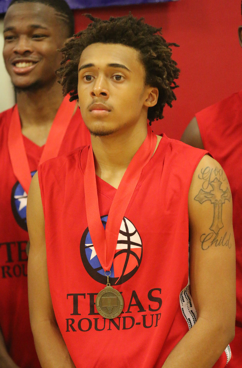 Image: Keith Davis II poses with his RED teammates and their All-Star medals following the 16th Annual Maypearl Texas Roundup All-Star games.